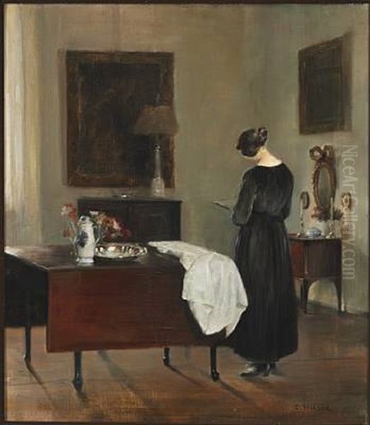 The Painter's Wife Reading In A Corner In The Living Room Oil Painting by Carl Vilhelm Holsoe