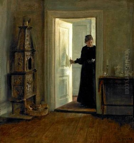 Interior With A Woman Carrying A Tray Through A Sunlit Doorway Oil Painting by Carl Vilhelm Holsoe