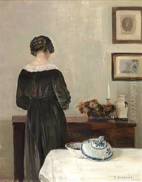 Interior Med Kunstnerens Hustru Staende Ved En Kommode Oil Painting by Carl Vilhelm Holsoe