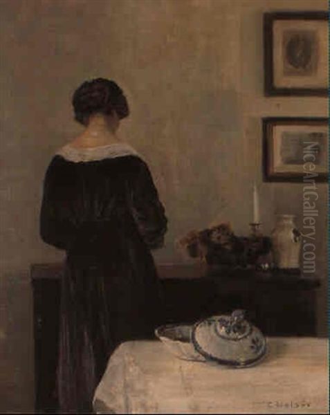 Interior Med Kunstnerens Hustru Staende Rygvendt Ved En Kommode Oil Painting by Carl Vilhelm Holsoe