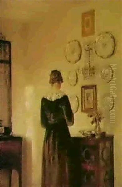 A Lady By A Cabinet Oil Painting by Carl Vilhelm Holsoe