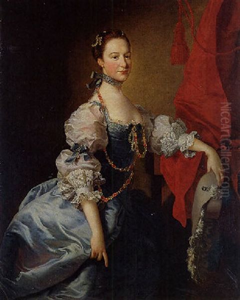 Portrait Of A Lady In A Blue Gown With White Sleeves, Holding A Hat And Standing In An Interior With A Red Curtain Oil Painting by Thomas Hudson