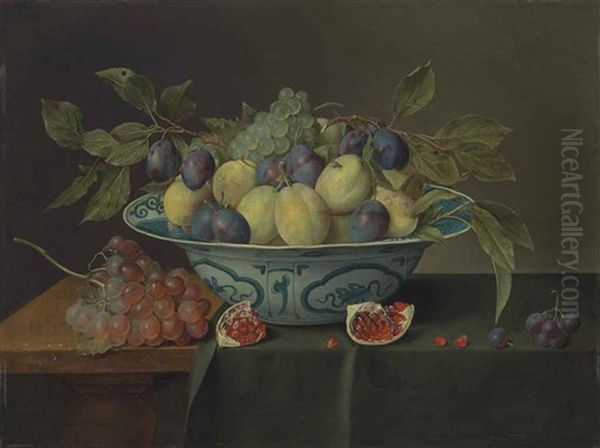 Plums And Grapes In A Porcelain Bowl, With Slices Of A Pomegranate And Grapes On A Partially Draped, Wooden Table Oil Painting by Jacob van Hulsdonck