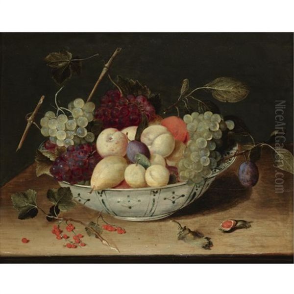 Still Life With Grapes, Peaches, Plums And Other Fruit In A Blue And White Porcelain Bowl, Redcurrants And Hazelnuts Scattered On The Wooden Ledge Below Oil Painting by Jacob van Hulsdonck