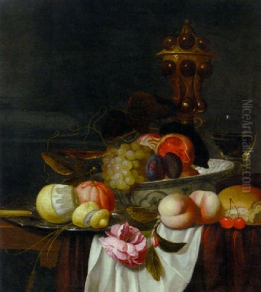 Grapes, Pomegranates And Plums In A Wanli Kraak Porselein Bowl, An Orange And A Partly Peeled Lemon On A Pewter Plate Oil Painting by Jacob van Hulsdonck