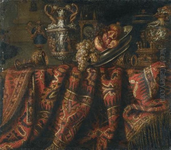 A Still Life With Pomegranates, And Grapes On A Table Draped With An Ornate Turkish Carpet And Assorted Orfevrerie Oil Painting by Jacques Hupin