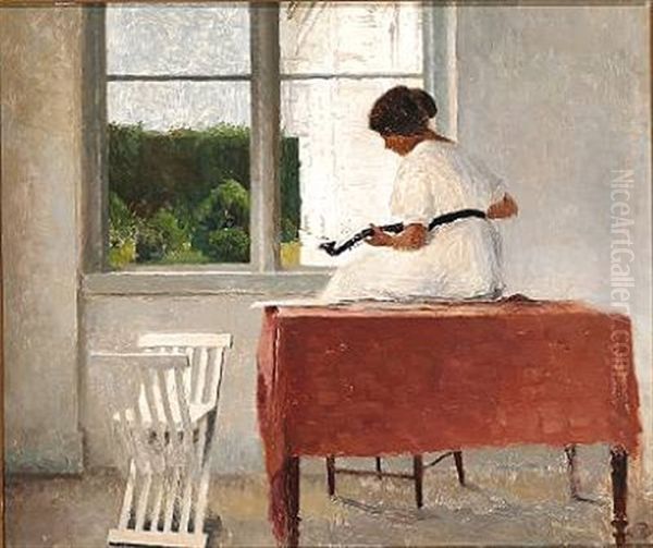 Interior With A Woman In A White Dress Sitting On A Table With A Red Tablecloth Playing The Mandolin Oil Painting by Peter Vilhelm Ilsted