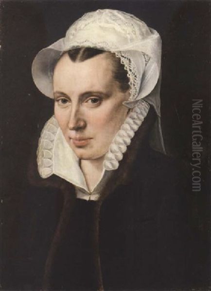 Portrait Of A Lady, Aged 31, In A Black Dress Trimmed With Fur, A White Ruff Collar And A White Headdress Oil Painting by Adriaen Thomasz Key