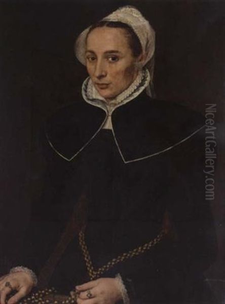 Portrait Of A Lady Wearing A Black Dress With A White Collar And Headdress, Holding A Gold Chain Oil Painting by Willem Key