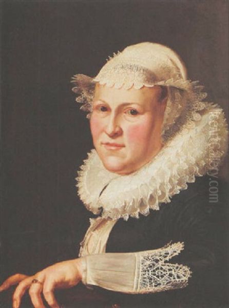 A Portrait Of A Lady Wearing A Black Dress With Lace Headdress, Cuffs And Collar, Leaning With Her Left Arm On A Ledge Oil Painting by Thomas De Keyser