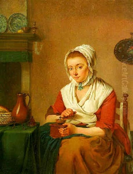 A Maid, Seated By A Table In A Kitchen, Grinding Coffee Oil Painting by Jacobus Johannes Lauwers