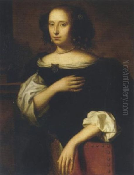 Portrait Of A Lady In A Black Dress, Her Left Arm Resting On A Red Leather Chair Oil Painting by Isaac Luttichuys