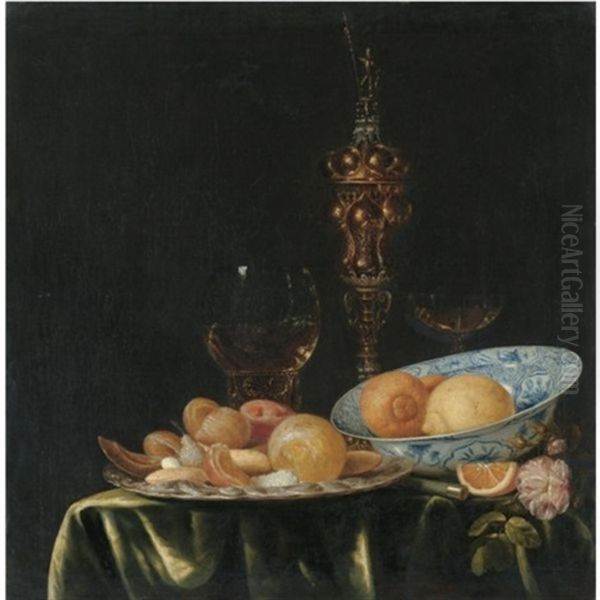 Still Life With Oranges And Lemons In A Blue And White Porcelain Dish, A Large Gold Pronckblokaal And A Silver Platter, All Arranged On A Draped Table Oil Painting by Simon Luttichuys