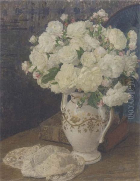 White Roses In A Vase, A Lace Handkerchief And A Book On A Table In An Interior Oil Painting by Edgar Maxence