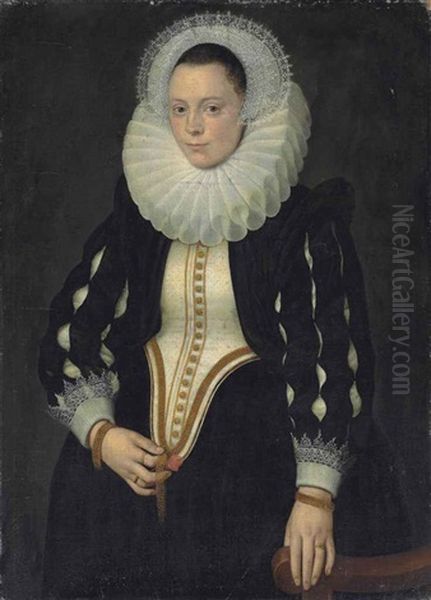 Portrait Of A Woman, Three-quarter-length, In A Black Dress With A Stomacher, Slashed Sleeves, Lace Cuffs, A Ruff And A Lace Headdress, Holding A Rose Oil Painting by Michiel Janszoon van Mierevelt