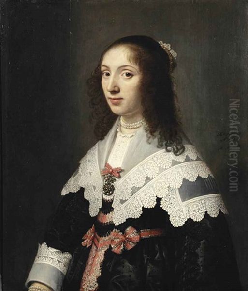 Portrait Of Agatha De Vlaming Van Oudtshoorn (1619-1675), Half-length, In An Embroidered Black Dress With Red And Silver Silk Decorations, With A White Lace Collar And Cuffs, A Pearl Necklace And A Jewelled Tiara Oil Painting by Michiel Janszoon van Mierevelt