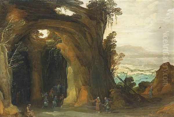 A Landscape With Pilgrims Attending Mass In A Grotto, A Monk Reading In The Foreground by Philips de Momper the Elder