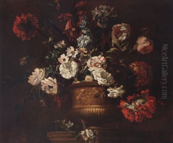 Roses, Delphiniums, Carnations, Peonies, Narcissi And Other Flowers In A Sculpted Urn On A Stone Ledge Oil Painting by Jean-Baptiste Monnoyer