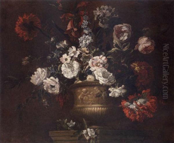 Roses, Delphiniums, Carnations, Peonies, Narcissi, And Other Flowers In A Sculpted Urn On A Stone Ledge Oil Painting by Jean-Baptiste Monnoyer