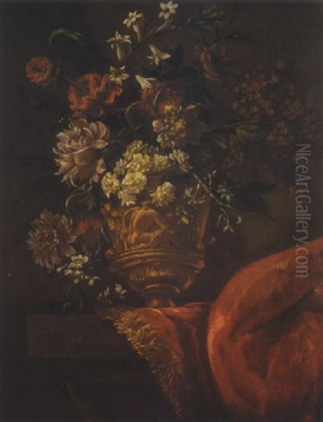 A Still Life Of Various Flowers In A Gilt Sculpted Urn, Upon A Stone Pedestal, Partly Draped With A Rug Oil Painting by Jean-Baptiste Monnoyer