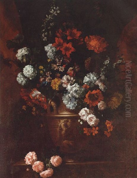 A Still Life Of Roses, Parrot Tulips, Lilac, Marigolds, Cornflowers And Other Flowers In A Sculpted Vase On A Stone Plinth Within A Niche Oil Painting by Jean-Baptiste Monnoyer