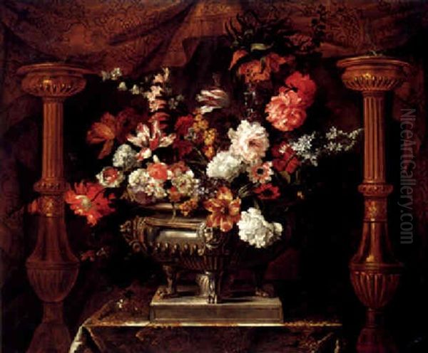 A Still Life Of Various Flowers In A Silver Gilt Urn, Flanked By Two Torcheres, An Embroidered Curtain Draped Behind Oil Painting by Jean-Baptiste Monnoyer