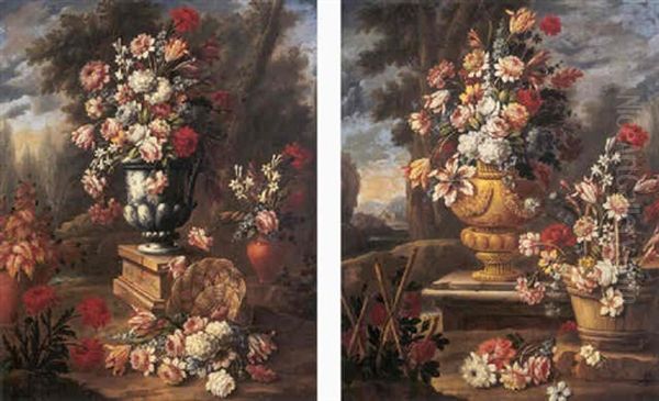 Roses, Parrot Tulips, Delphinia, Hydrangea And Other Flowers In A Porcelain Urn On A Plinth With Other Flowers In A Basket, In A Landscape Oil Painting by Giacomo Nani