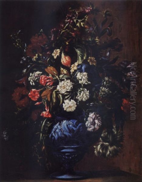 A Still Life With Roses, Carnations, Poppy, Anemones, Cornflowers, Irises, Lilies, And Other Flowers In A Blue Stone Vase Oil Painting by Mario Nuzzi