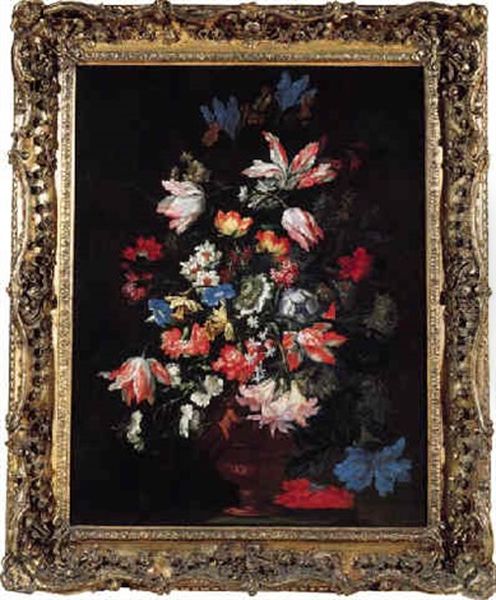 Tulips, Carnations, Chrysanthemums And Other Flowers In A Sculpted Vase On A Stone Ledge Oil Painting by Mario Nuzzi