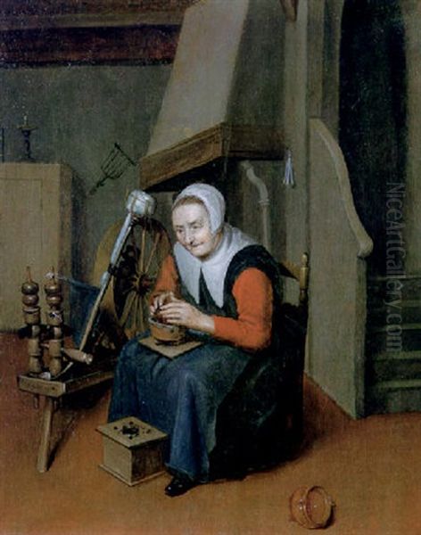 An Interior With An Old Woman Seated At A Spinning Wheel Warming Her Hands Over A Brazier Oil Painting by Johannes Dircksz Oudenrogge