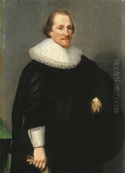 Portrait Of A Gentleman, Aged 30, In Black Costume And A Lace Ruff, His Gloves In His Right Hand Oil Painting by Nicolaes Eliasz Pickenoy