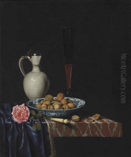 A Wan-li Bowl With Walnuts, A Facon De Venise Wine Glass, An Ivory-handled Knife, A Delft Stoneware Jug And A Rose On A Partially Draped Marble Ledge Oil Painting by Hubert van Ravesteyn