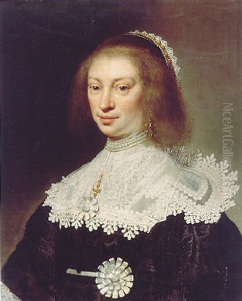 Portrait Of A Lady Wearing An Embroidered Black Dress, A Lace Collar, A Pearl Necklace And A Lace And Jewelled Headdress Oil Painting by Jan Anthonisz Van Ravesteyn