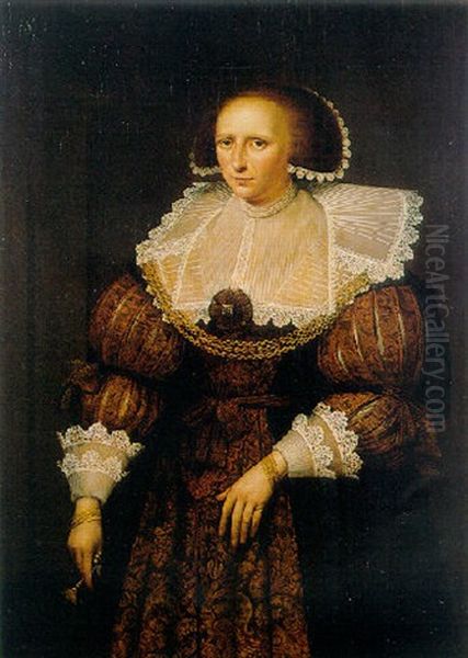 Portrait Of A Lady Wearing A Gold Embroidered Dark Dress With Slashed Sleeves, Holding A Fan Oil Painting by Jan Anthonisz Van Ravesteyn