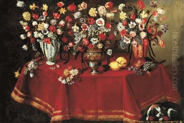 Arrangements Of Flower Bouquets In A Majolica Vase, A Sculpted Pewter And Bronze Urn And A Ceramic Ewer On A Draped Octagonal Table With Two Lemons And Other Flowers, With A Dog Resting Oil Painting by Giuseppe Recco