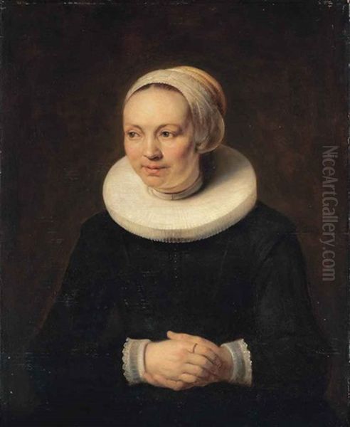 Portrait Of A Lady, Half-length, In A Black Dress, With White Ruff, Lace Cuffs And White Headdress Oil Painting by  Rembrandt van Rijn