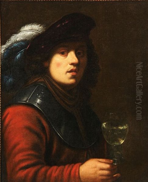 A Young Man Holding A Goblet Oil Painting by  Rembrandt van Rijn