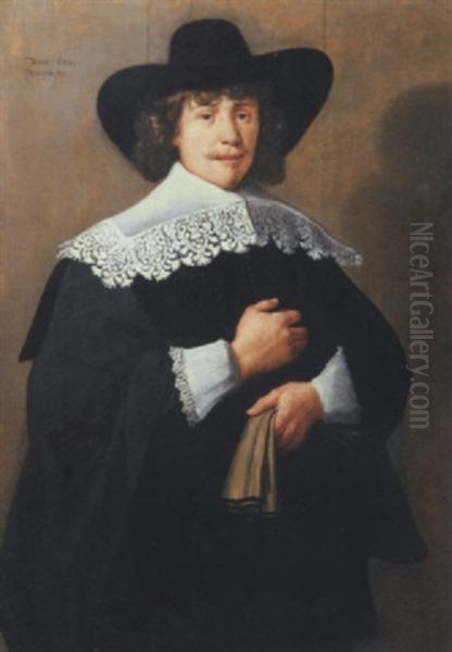 Portrait Of A Gentleman In A Black Broad-rimmed Hat And Black Costume With A White Lace Collar And Cuffs And Hat, His Gloves In His Left Hand Oil Painting by  Rembrandt van Rijn