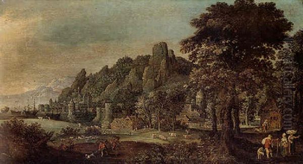 A Rocky Wooded Landscape With A Coastal Town Oil Painting by Marten Ryckaert