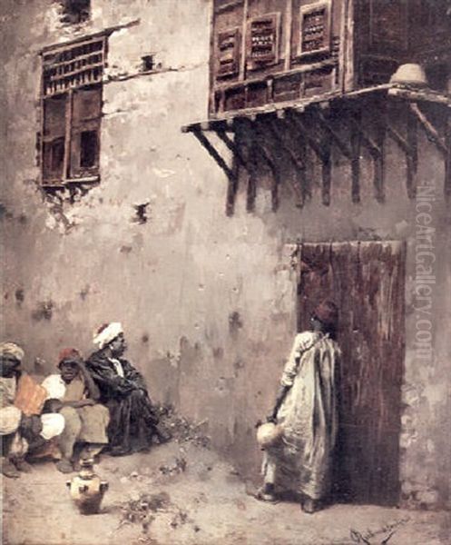 A North African Building Front With A Figure On A Door And Others Seated On The Ground Oil Painting by Rubens Santoro