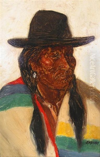 An Indian With A Colorful Blanket And A Hat by Joseph Henry Sharp