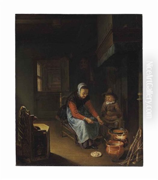 A Woman Cooking Pancakes With A Young Boy Before A Hearth Oil Painting by Pieter Cornelisz van Slingeland