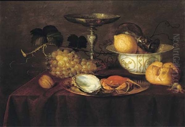 A Silver Dish With An Oyster And A Crab, A Walnut, White Grapes, A Silver Tazza, A Porcelain Bowl With Lemons And A Roemer, A Bread Roll, All On A Draped Table Oil Painting by Theodorus (Dirk) Smits