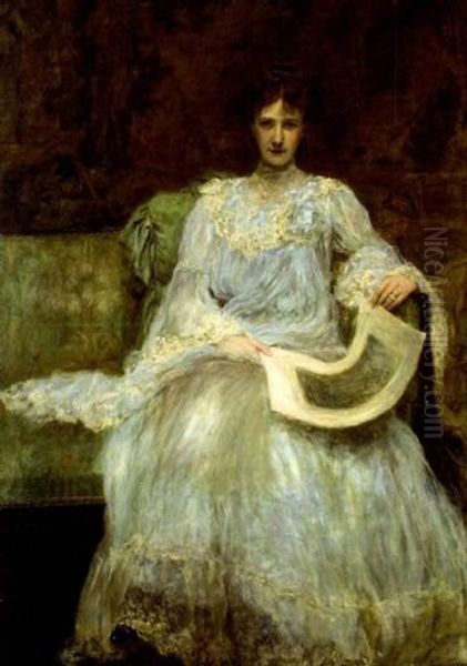 Portrait Of A Lady Seated Wearing A Blue Dress by Edwin Swan