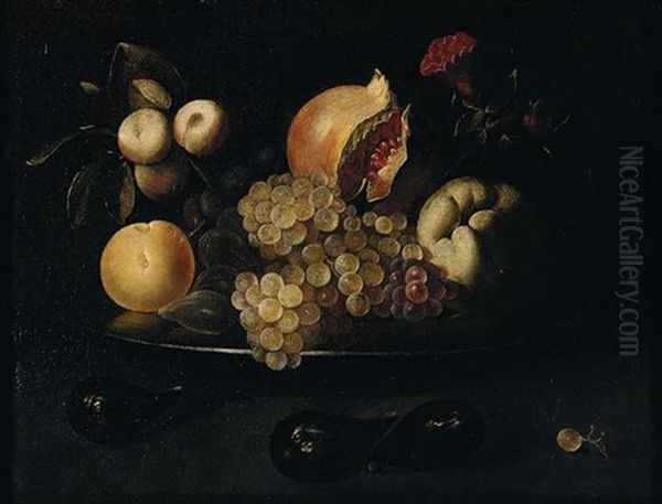 Still Life Of Grapes, Pomegranates, Apples, Peaches, Plums And Figs On A Silver Dish, Together With Figs And A White Grape Arranged Upon A Table Top Oil Painting by Juan de Zurbaran