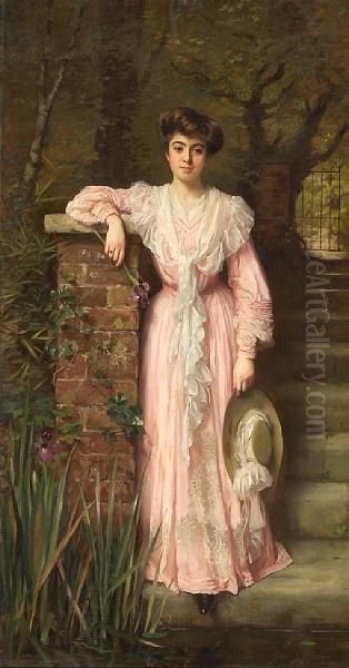 A Portrait Of A Lady In A Garden Wearing A Pink Dress Holding An Iris Oil Painting by Thomas Benjamin Kennington