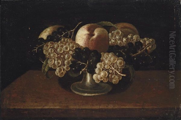 A Silver Tazza With White And Red Grapes And Peaches, On A Wooden Table Oil Painting by Panfilo Nuvolone