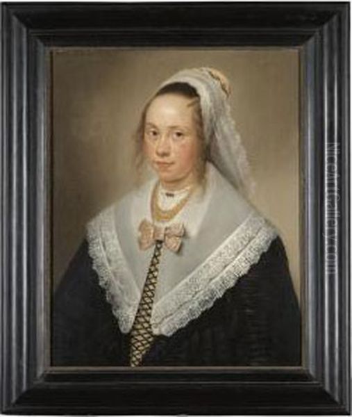 Portrait Of A Young Lady, Said To Be Elisabeth Wybo, At The Age Of 17, Half Length, Wearing A Gold Necklace And A White Headdress Oil Painting by Jan Albertz. Rotius