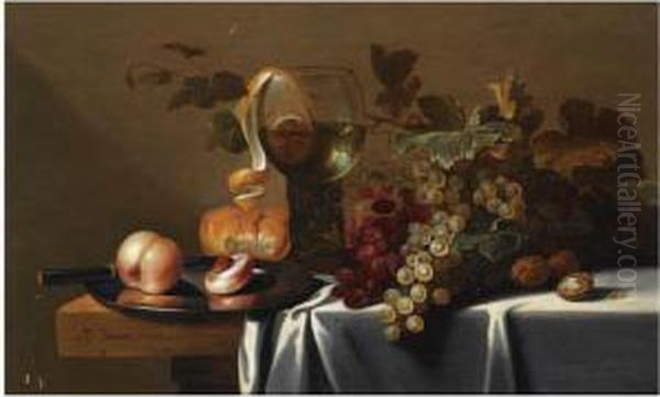 Still Life With Blue And White Grapes, Chestnuts, A Loaf Of Bread,peaches And A Knife On A Pewter Plate, With A Peeled Lemon In Aroemer, All Arranged On A Partly Draped Table Oil Painting by Michiel Simons