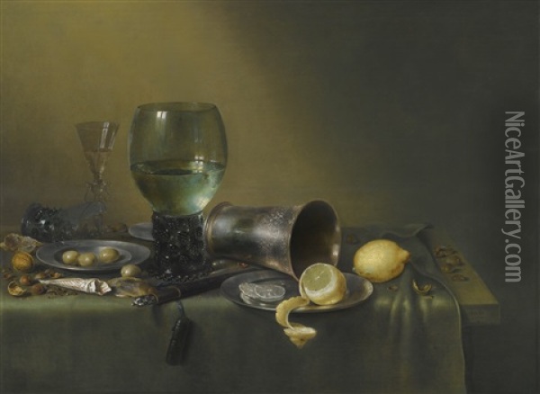 A Still Life Of A Roemer, An Overturned Roemer, A Facon-de-venise Wineglass, A Silver Beaker And A Silver And Pewter Plate, With A Sheathed Knife, Lemons, Olives, Hazelnuts, Walnuts And A Paper Twist Of Tobacco, All On A Table Partly Draped With A Green C Oil Painting - Willem Claesz Heda